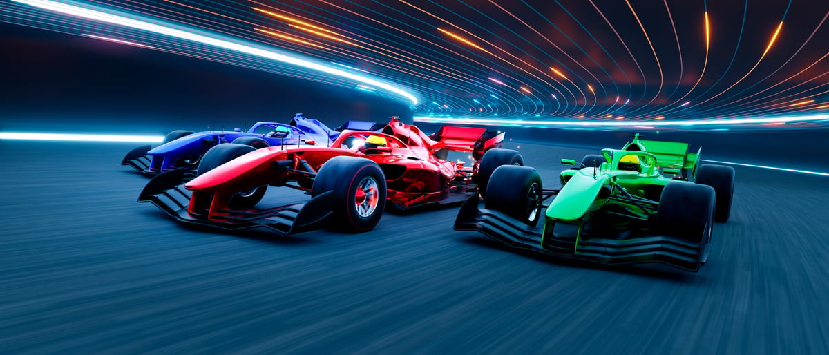 High-performance open-wheel race cars in competition on a glowing circuit